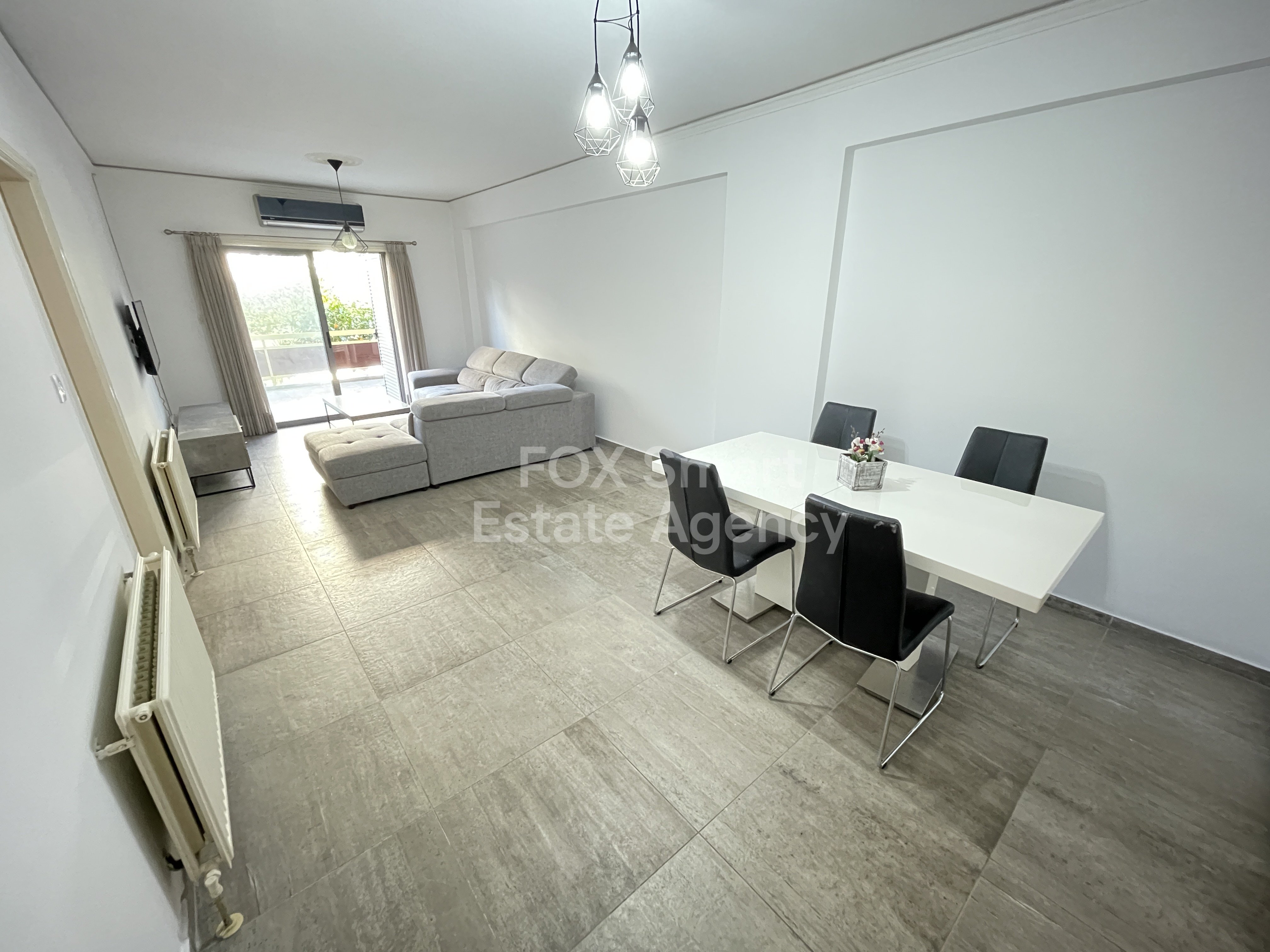 FOR RENT - Furnished 2 bedroom apartment with yard near Esperidon street