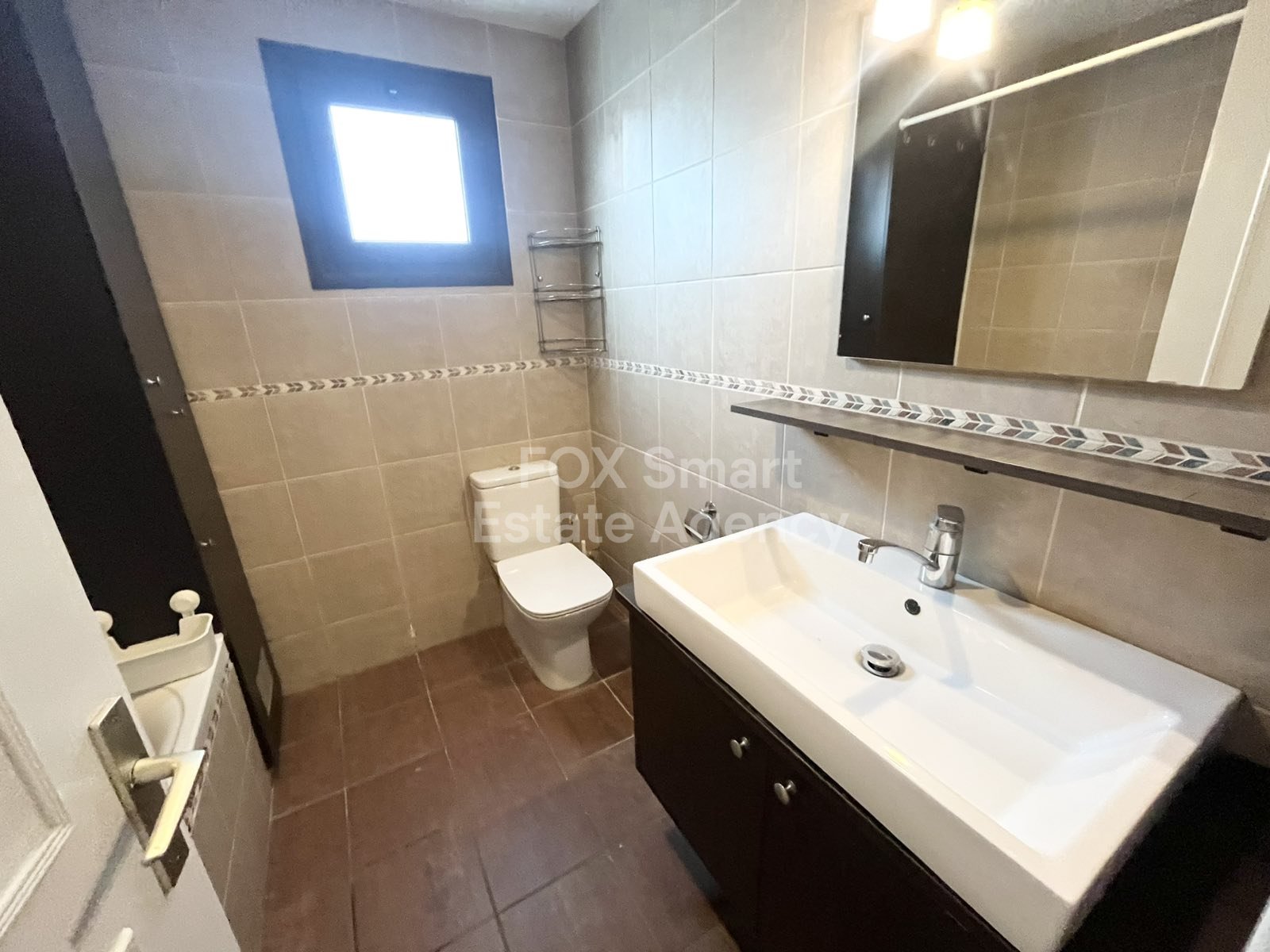 For rent 3 bedroom ground floor apartment in Agioi Omologites, near American School.