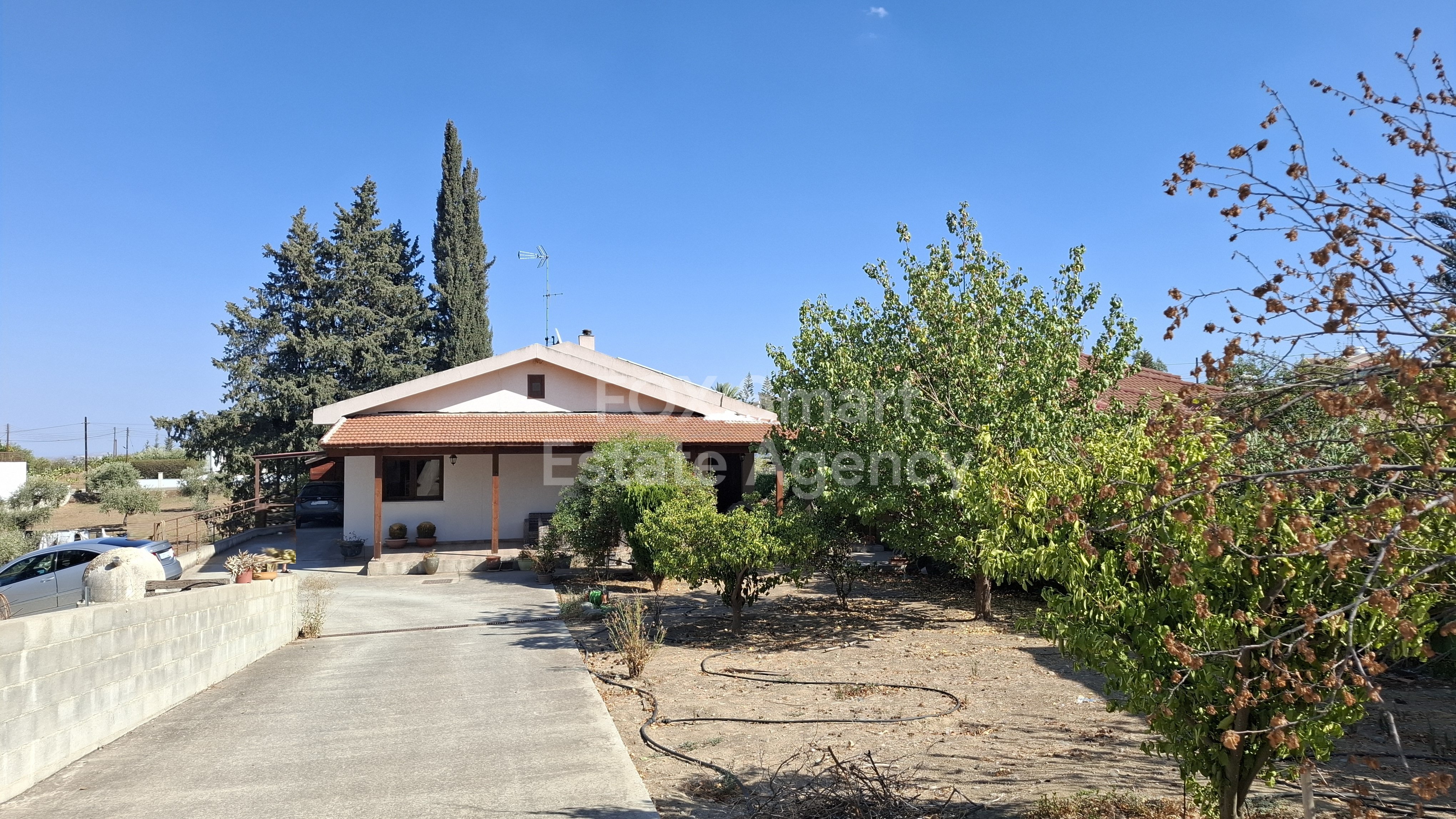 Beautiful home, on a large land, close to the center of the village