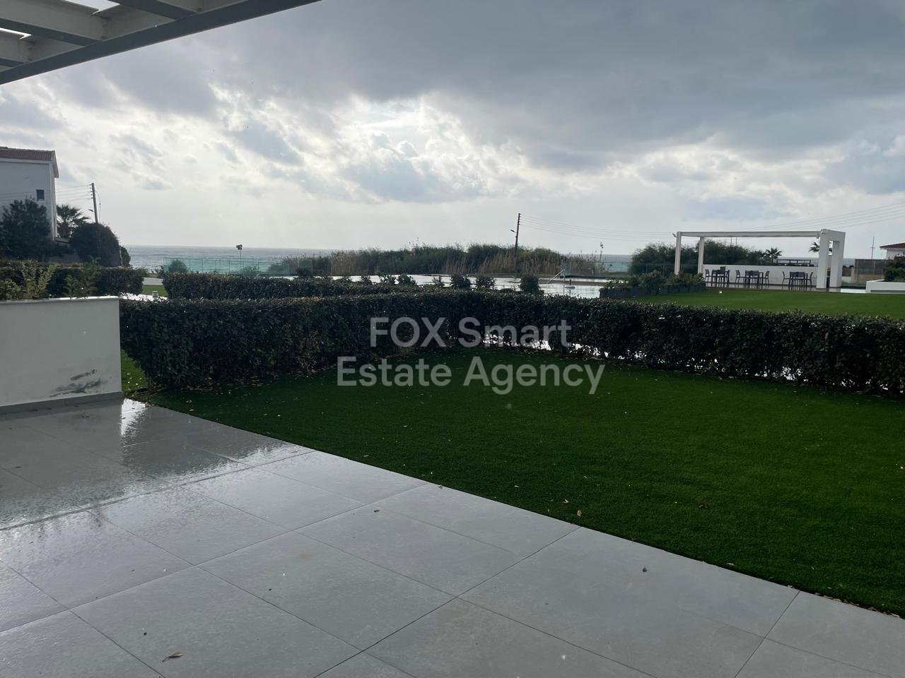 Garden Haven – Absolute Beachfront Living | Perivolia