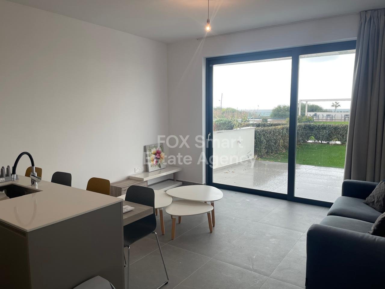 Garden Haven – Absolute Beachfront Living | Perivolia