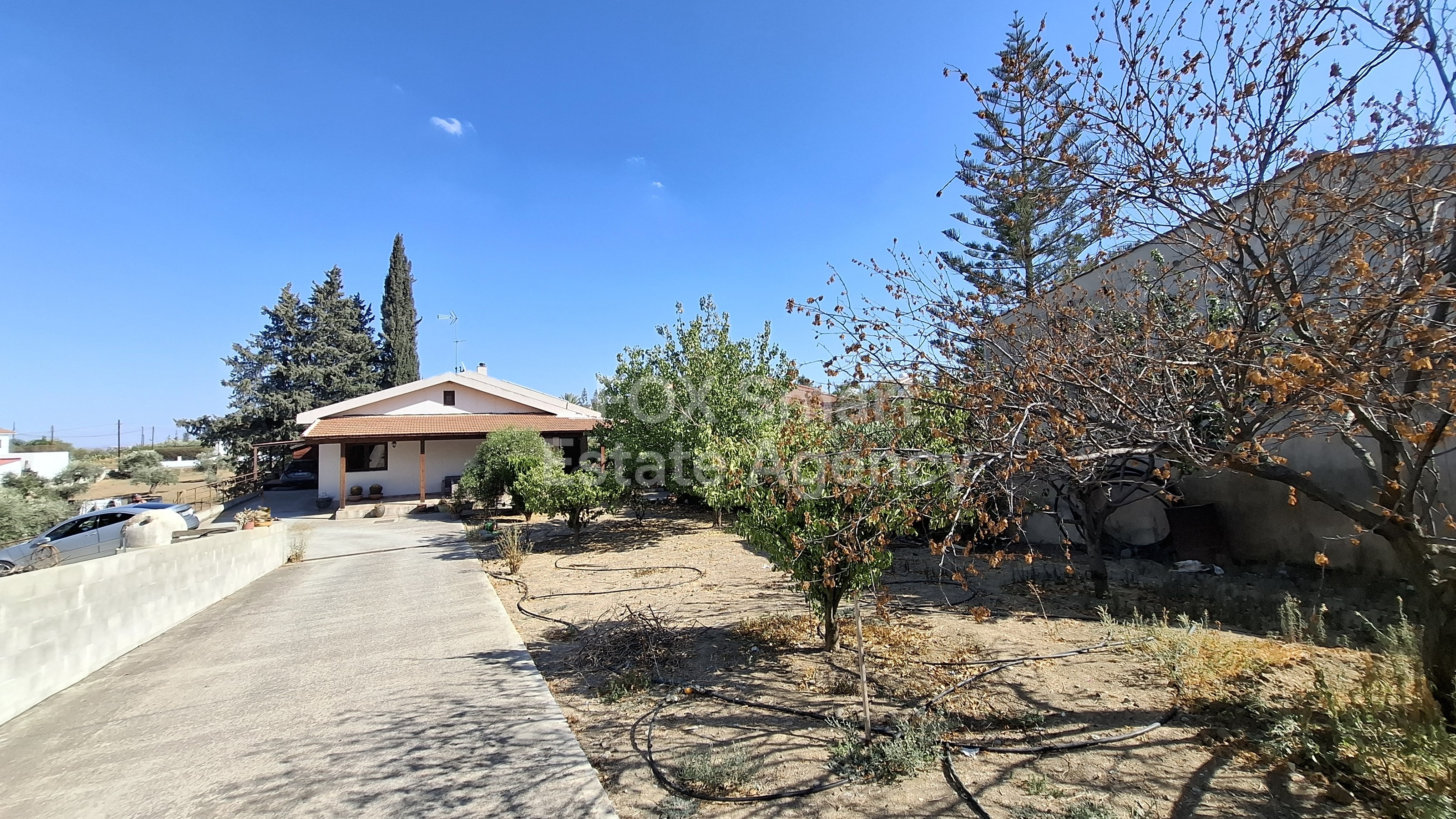 Beautiful home, on a large land, close to the center of the village