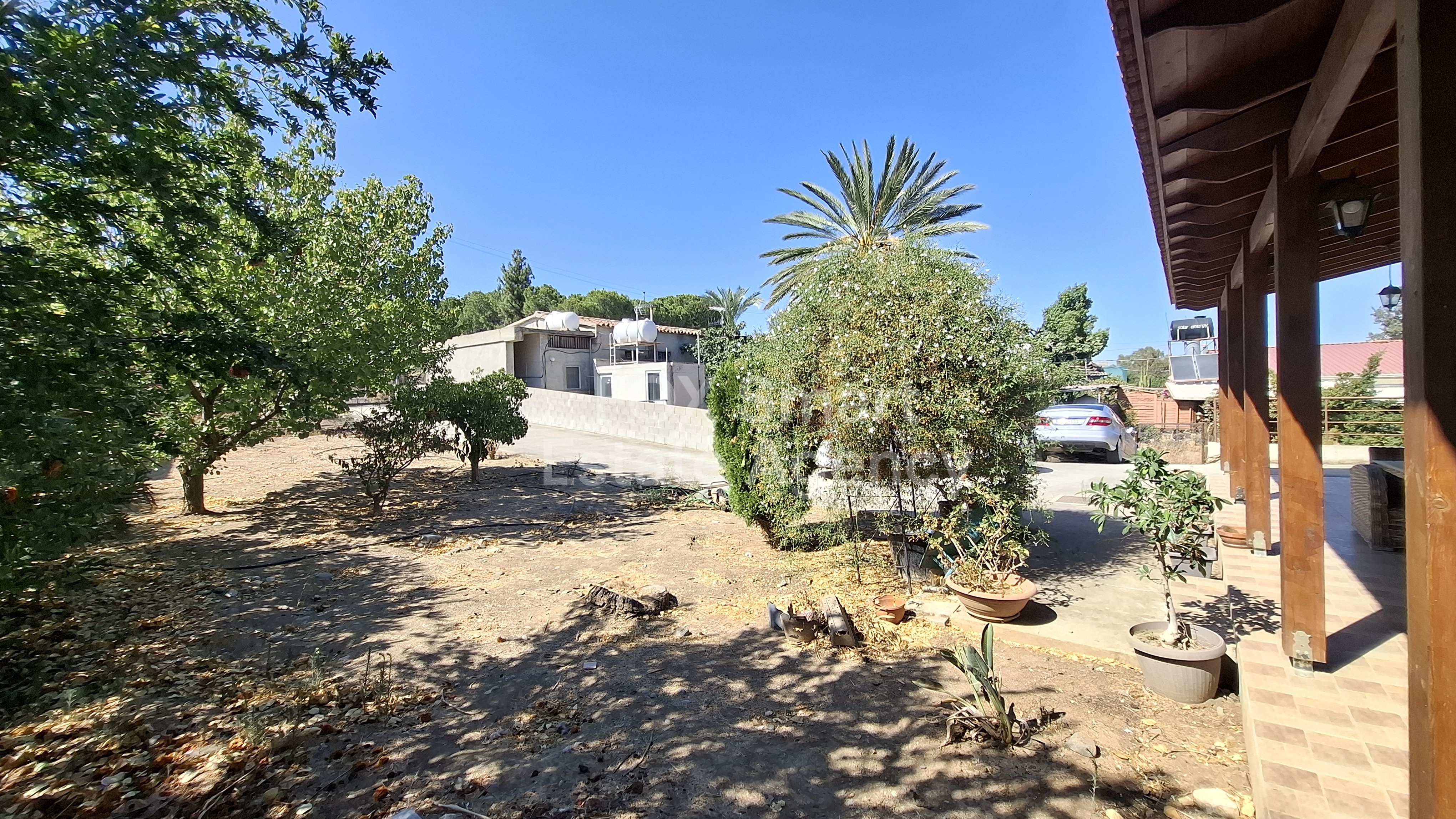 Beautiful home, on a large land, close to the center of the village