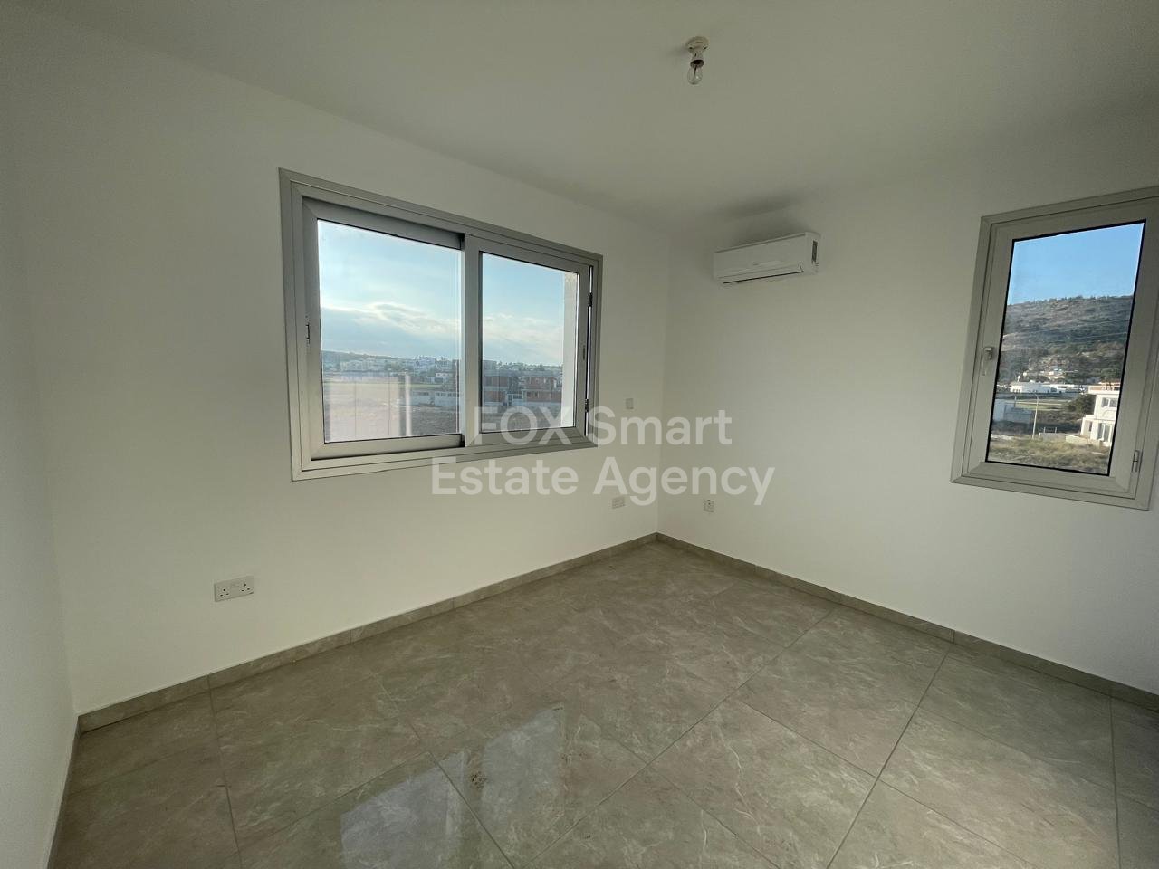2-Bedroom Apartment for Rent with Communal Pool & Hill Views in Oroklini