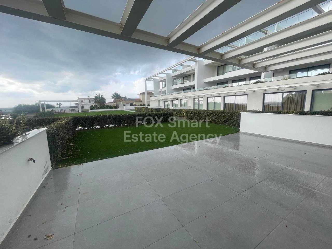 Garden Haven – Absolute Beachfront Living | Perivolia