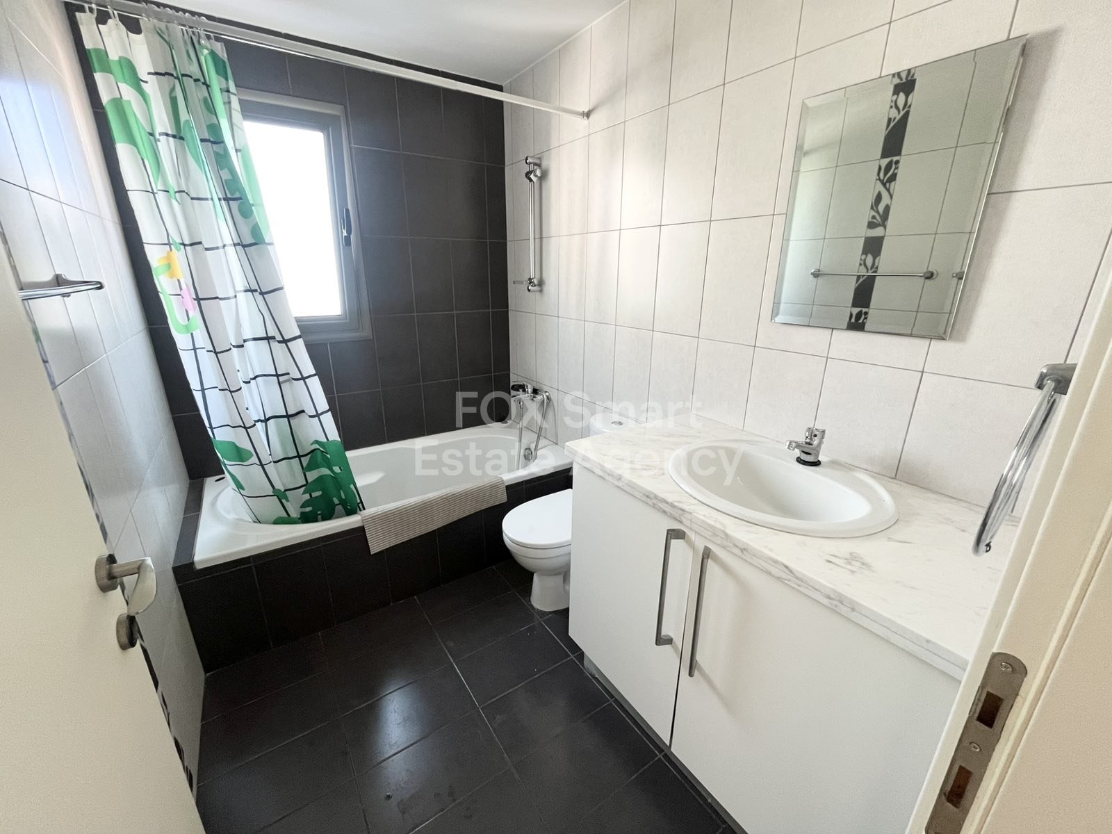 For rent 2 bedroom fully-furnished apartment close to KPMG and John Kennedy Street in Acropolis, Nicosia.