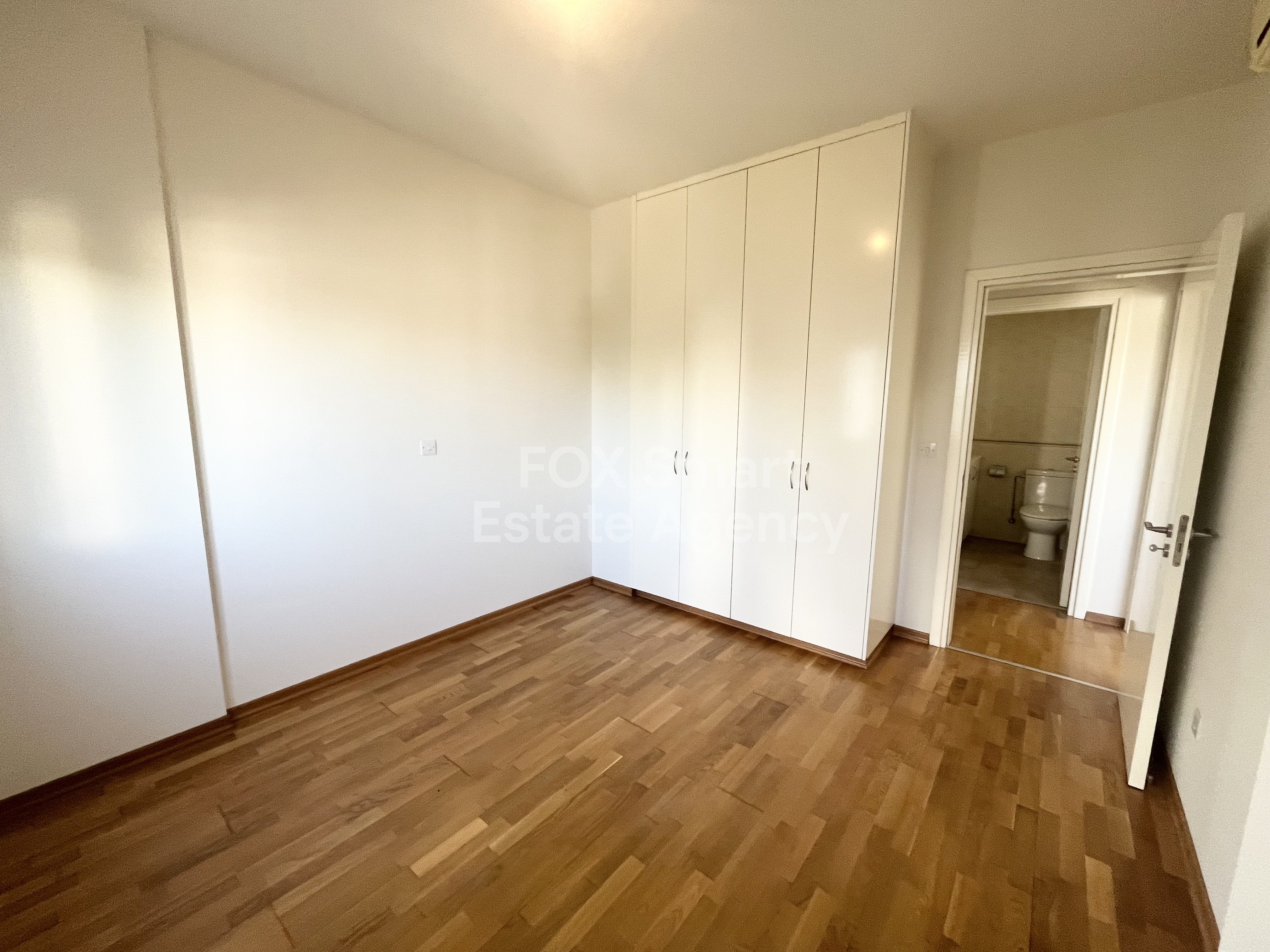 For rent 2 bedroom unfurnished  apartment close to KPMG and John Kennedy Street in Acropolis, Nicosia.