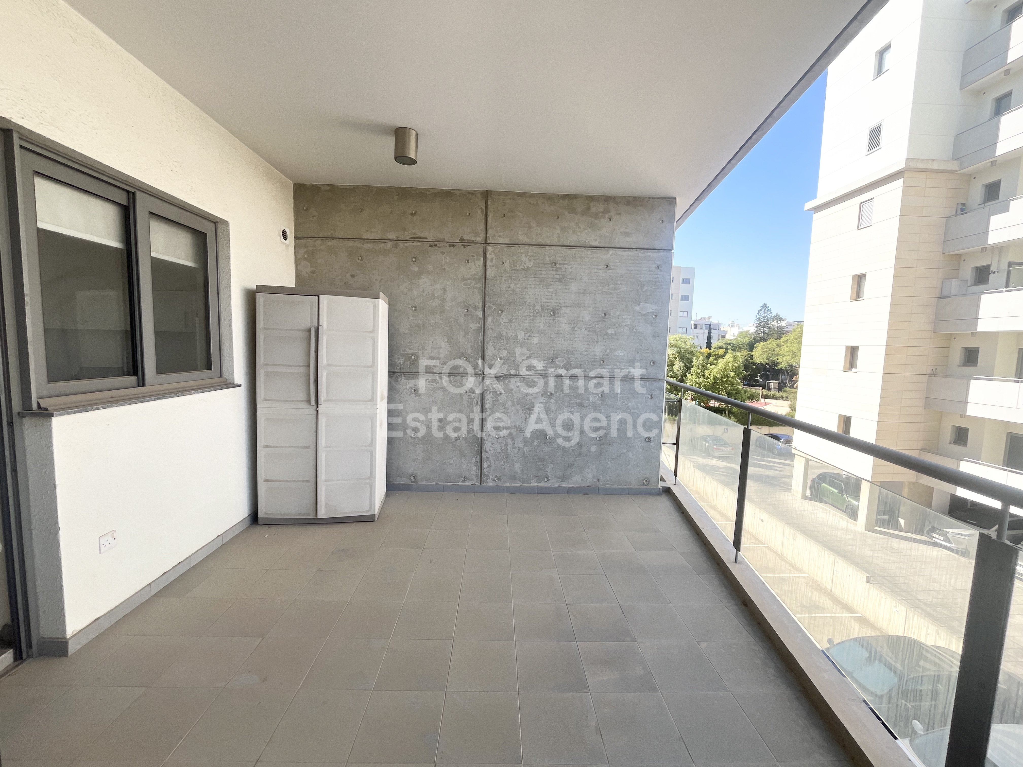 For rent 2 bedroom unfurnished  apartment close to KPMG and John Kennedy Street in Acropolis, Nicosia.
