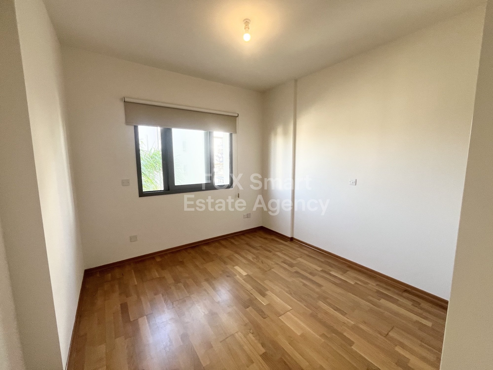 For rent 2 bedroom unfurnished  apartment close to KPMG and John Kennedy Street in Acropolis, Nicosia.