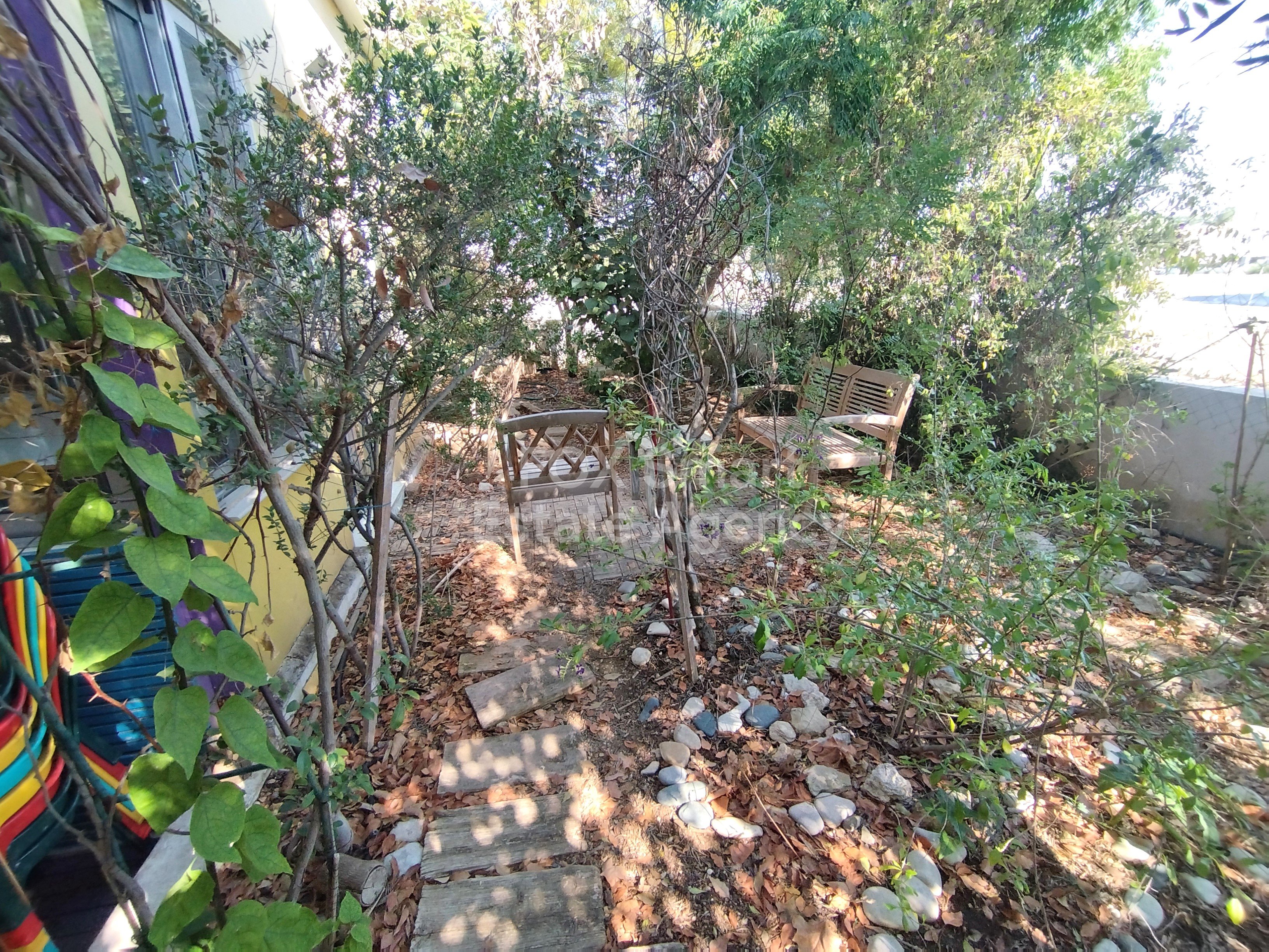 Space, Comfort & Location – 4-Bedroom Residence with Attic & Courtyard