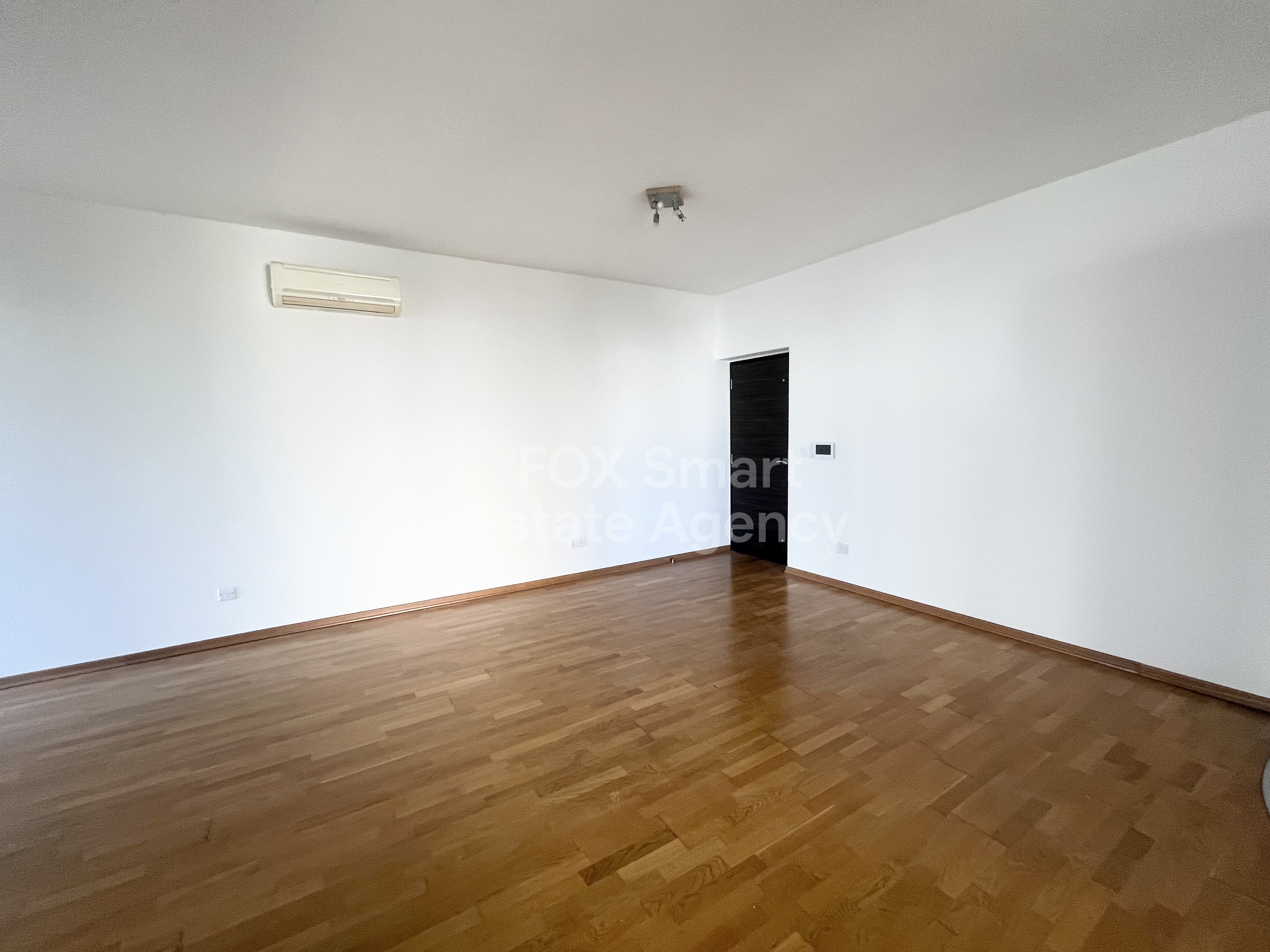 For rent 2 bedroom unfurnished  apartment close to KPMG and John Kennedy Street in Acropolis, Nicosia.