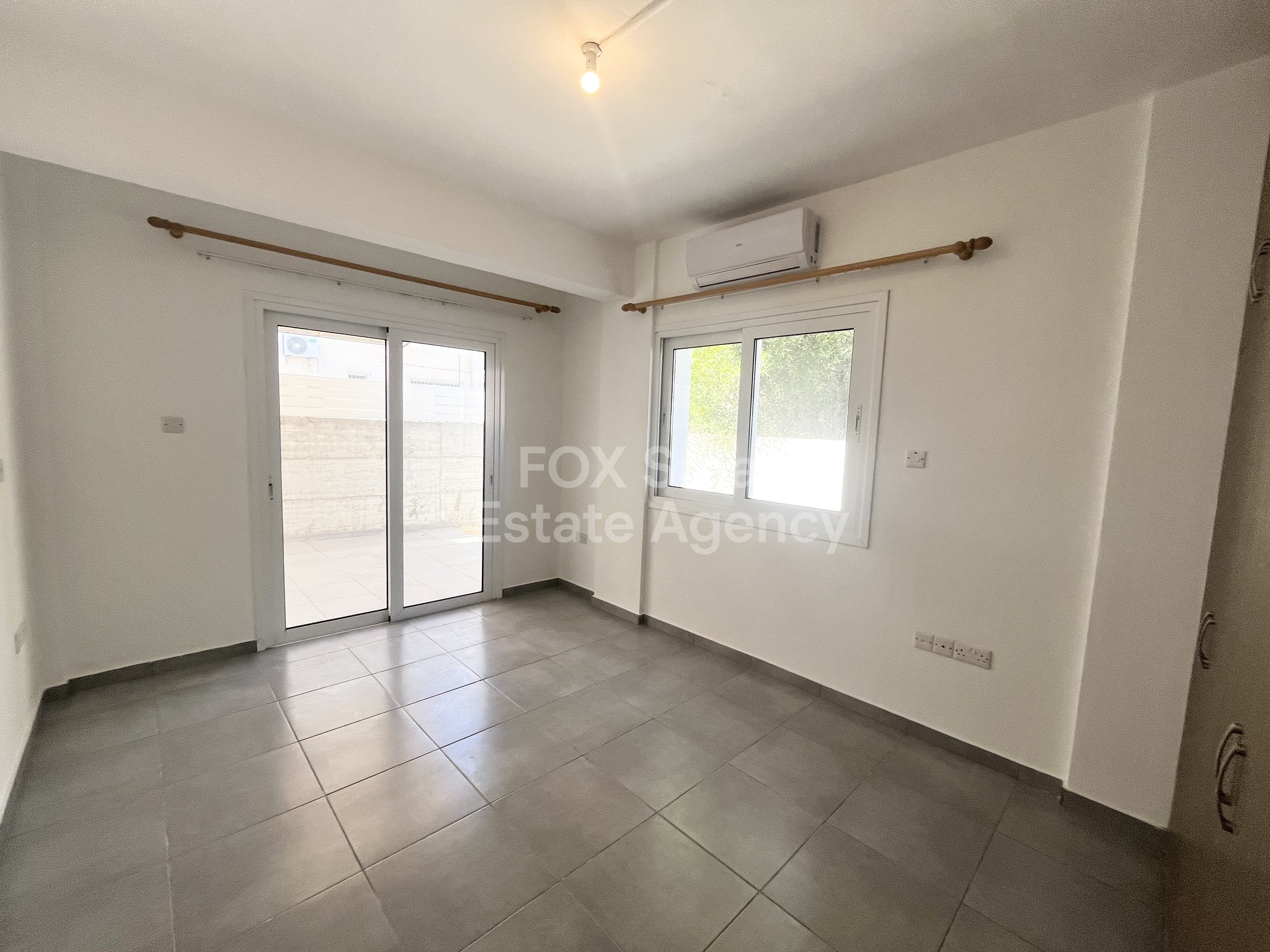 For rent 4 bedroom ground floor apartment in Makedonitissa, Nicosia.