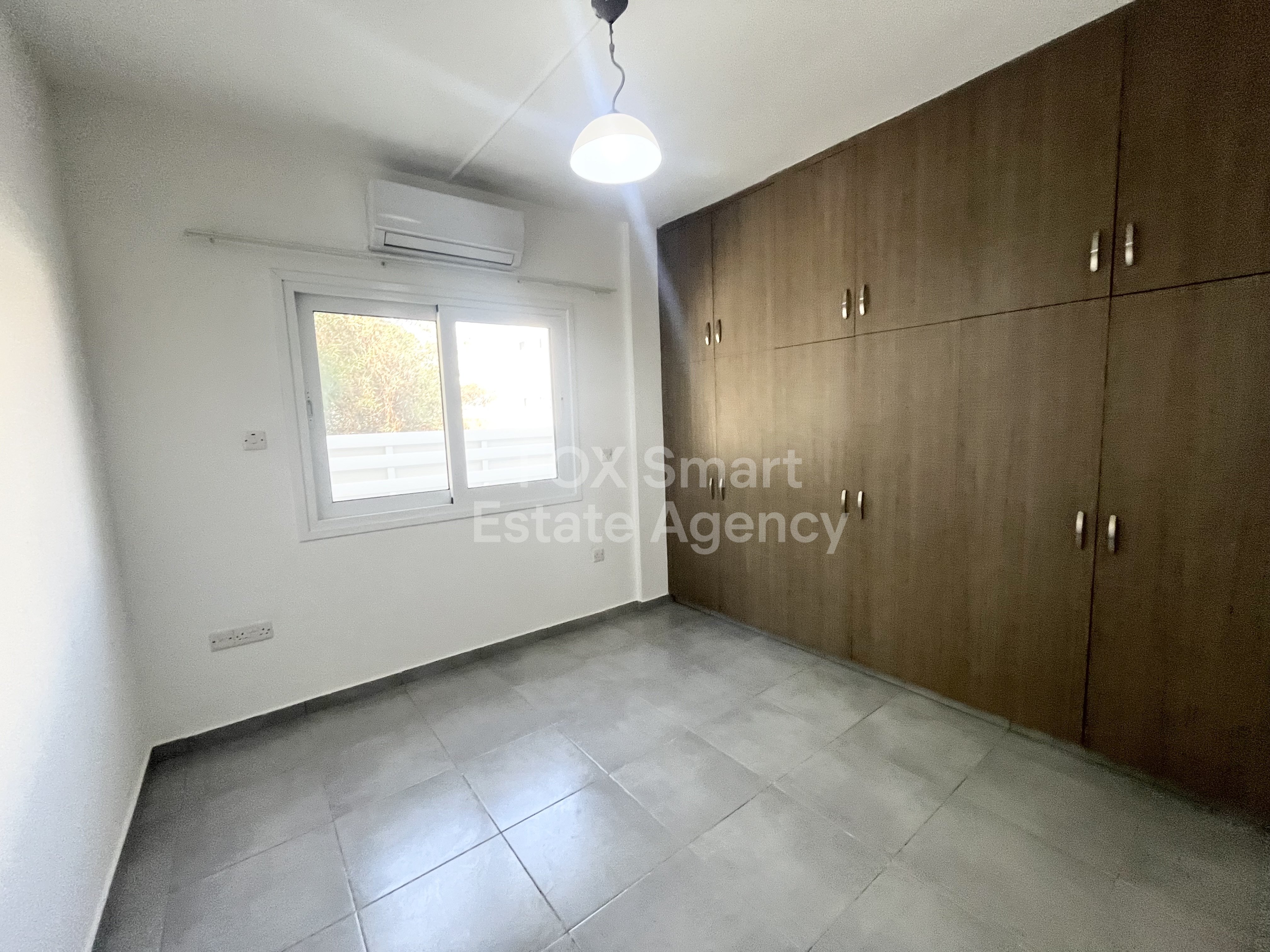 For rent 4 bedroom ground floor apartment in Makedonitissa, Nicosia.