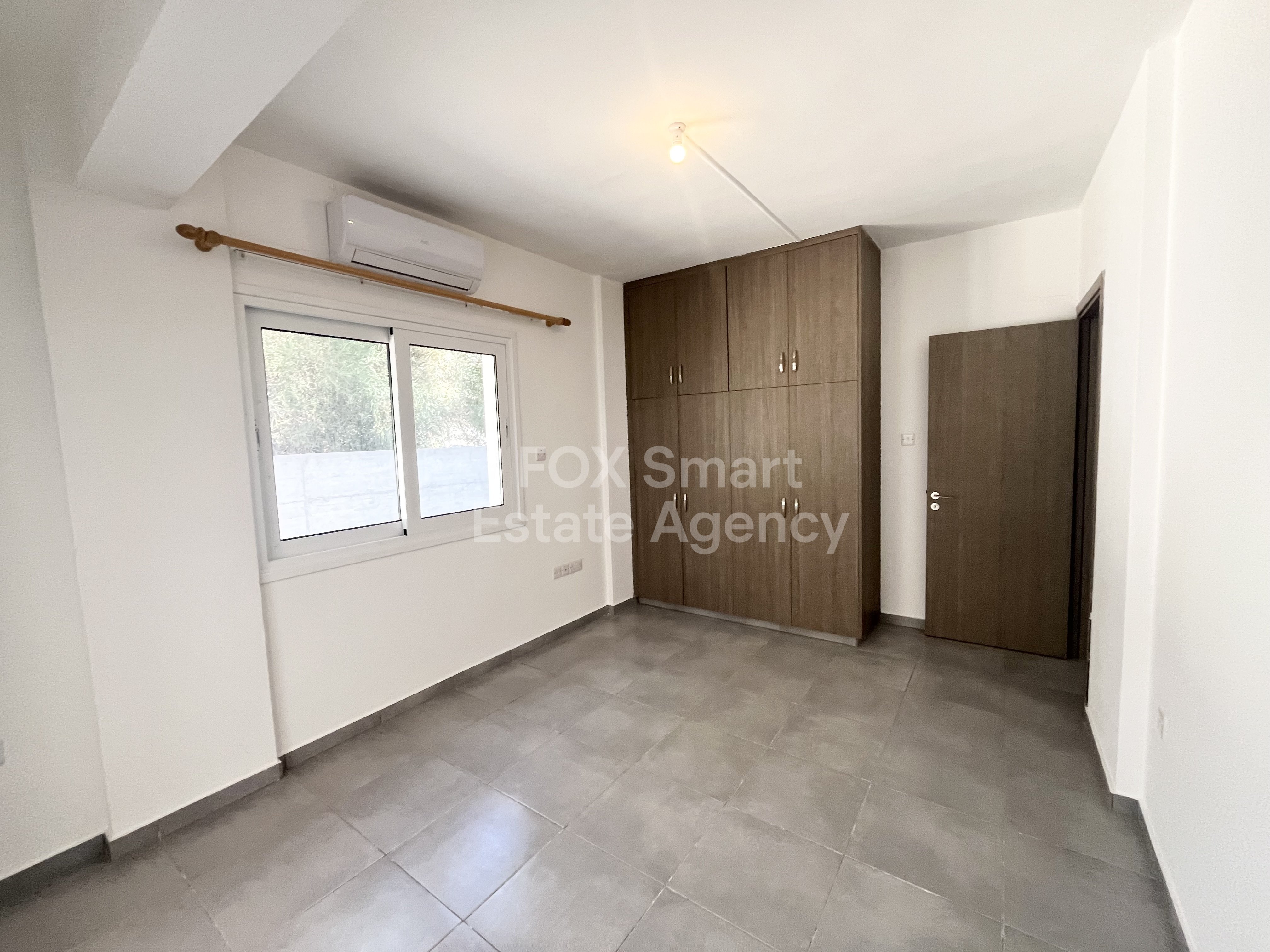 For rent 4 bedroom ground floor apartment in Makedonitissa, Nicosia.