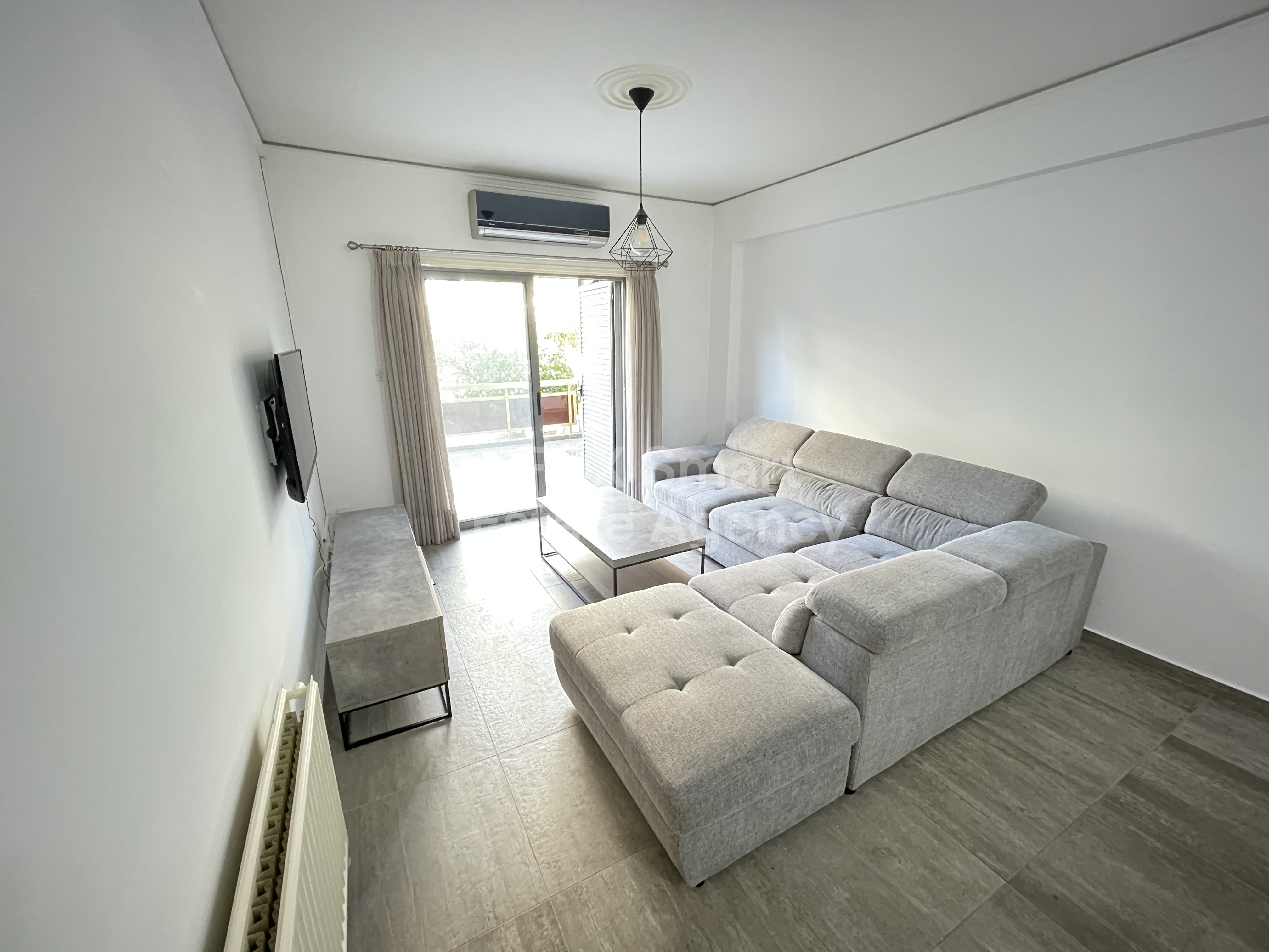 FOR RENT - Furnished 2 bedroom apartment with yard near Esperidon street